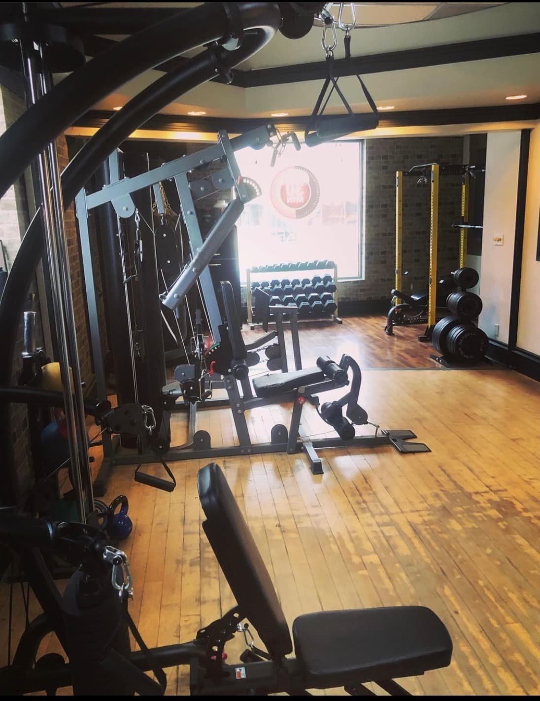 Quickfit gym interior with equipment and natural lighting